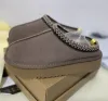 مان نساء مصممي Tazz Platform Slippers Snow Boots تحافظ على دافئة الحذاء ناعمًا مريحًا من جلد الغنم أفخم من النعال غير الرسمية.
