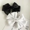 Mädchenhaarklammern Süße Bogenfrühlingsklammern Schwarz weiße Band Bowknot Barrettes Doppelschicht Frauen Haarnadel Luxusdesigner Haarzubehör Accessoires