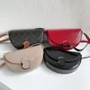 Kvinnor tonåring triomfes koppling sadel halv månpåse mens satchel luxurys designer äkta läder crossbody väska lady tote handväska klassisk klaff handväska sling axelväskor