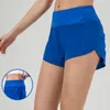 Femmes shorts arrière Back Zipper Pockets Sports Shorts avec doublure en cours d'exercice court entraînement de gymnase Shorts d'entraînement sportif short Jogger 6 couleurs