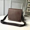 Men de couro PU de alta qualidade Tote Bags de crossbody Designer de luxo Compras de moda Câmera Câmera CARTÃO Bolsa bolso de bolsa A10