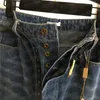 Pantaloni di giunzione di piume jeans per donna designer model denim pantalone street style gamba dritta gambe con cintura