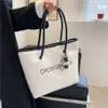 Sac nouveau sac à bandoulière simple pour femmes, mode coréenne tendance loisirs grande capacité Portable impression mate fourre-tout