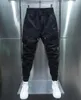 Calça de cargo Men Artilhas de rua jogadoras de algodão Hip Hop Moda Sweatpantes masculino HAREM CASUAL TRUSHERS SUMPLER HARAJUKU PONTES HOMENS Mulheres 240417