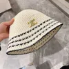 Summer hollow paper grass breathable fisherman hat for womens versatile fashion basin hat Korean version Triumphal Arch bucket hat sun hat