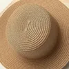 Bérets en gros pliable Panama Cowboy été soleil large bord tissé ruban de couleur unie disquette Fedora paille haut chapeau plage casquette femmes