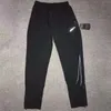 Quatre saisons nouveau pantalon à fermeture éclair à séchage rapide pantalon réfléchissant pantalon d'entraînement pour hommes sport Fitness Marathon entraînement d'athlétisme