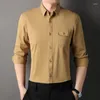 Camicie eleganti da uomo Abbigliamento di alta qualità Tinta unita Camicia casual da lavoro a maniche lunghe Abbigliamento formale in cotone M-4XL App di consegna a goccia allentata Otbwx