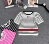 مصممة للنساء المحببة العلامة التجارية من T-Shirt T-Shirt Sweater Eversize Sweater قصيرة الأكمام القصيرة القصيرة