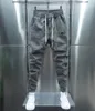 Calça de cargo Men Artilhas de rua jogadoras de algodão Hip Hop Moda Sweatpantes masculino HAREM CASUAL TRUSHERS SUMPLER HARAJUKU PONTES HOMENS Mulheres 240417