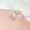 Simple ins personalized hollowed out star ring womens Korean east gate light bead five pointed star open ring jewelry