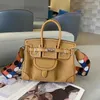 2024 nuova borsa da donna in vera pelle con inserto in tela moda tracolla a forma di onda borsa a tracolla diagonale singola portatile