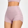 Peach -skinkor som lyfter Sports kvinnors veckade snäva shorts, snabb torkning av kondition, tre delar yogakort