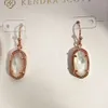 Kendrascott Collier Pendentif Designer Kendras Scotts Ks Simple Géométrie Elliptique Perle Fritillaria Shell Boucles D'oreilles 14k Or Véritable Préservation De La Couleur Galvanoplastie