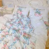 Sängkläder sätter fyrdelar bomullsmjölkig vit trädgård veckad printskirt high-end pastoral europeisk sänglagning i fyra säsonger