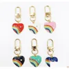 Nyckelringar Lanyards Fashion Diamond Set Love Rainbow Keychain Alloy Heart Bag Car Blue Devils Eye Keychains smycken Tillbehör GIFT DH2UX