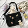 Axelväskor kvinnor kawaii crossbody pengar väska tryckt enkel avslappnad satchel flickor påse duk diagonal kors preppy stil