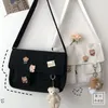 Axelväskor kvinnor kawaii crossbody pengar väska tryckt enkel avslappnad satchel flickor påse duk diagonal kors preppy stil