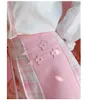 Hiver Kawaii Plaid Mini jupe femmes école fille Lolita coréenne taille haute mignon rose une ligne plissée esthétique Tennis jupes courtes 240321