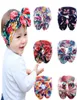 Nya 6Colors Baby Girls Stretch Multicolor Printing Big Bow pannband Spädbarn Blomma Hårband Söta barn Hårtillbehör C12782559954