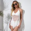 Sexy Fishnet Crochet Swimsuit Weave Treetted Bikini Swimsuit Femmes Swimwear Tassel Deux pièces Set Female Bathing Cosss 240321