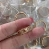 Originele Hot Selling Van Ring Puur zilver smalle plaat caleidoscoop klaver wijs vinger paar vrouwelijke volledige diamant gelukkige persoonlijkheidstaart met logo