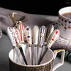 Tazze Piattini Tazza da caffè e piatto in ceramica Set europeo piccolo lusso inglese tè pomeridiano Nero per la casa Semplice Bone China