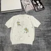 女性用TシャツデザイナーMファミリー24春/夏新しい重工業ネイルビーズフラワーパターンファッション年齢を減らすニット半袖女性rd9k