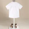 Estate manica corta tinta unita bianco neonato camicie bambini vestiti classico top bambini tee cotone ragazza maglione solido studente uniforme 240325