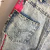 Jeans de grife mulheres roupas de marca para mulheres outono calças de perna reta moda Medusa retrato com renda vermelha emenda logotipo calças de menina abril 01