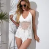 Sexy Fishnet Crochet Swimsuit Weave Treetted Bikini Swimsuit Femmes Swimwear Tassel Deux pièces Set Female Bathing Cosss 240321