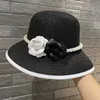 French elegant pearl camellia fisherman hat female Hepburn style sun shading and sun protection basin hat small fragrant grass hat