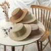 Bérets en gros pliable Panama Cowboy été soleil large bord tissé ruban de couleur unie disquette Fedora paille haut chapeau plage casquette femmes