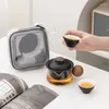 Ensembles de thé boule ronde tasse Express un Pot deux tasses service à thé en plein air en céramique Portable voyage chinois