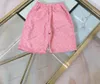Luksusowe zestawy odzieży designerskiej T-shirt Kids G Pink Setst Modna moda Brytyjska marka modowa Summer Childrens Treasures Boys and Girls Cotton Dwuczęściowy
