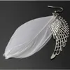 Boucles d'oreilles ailes d'ange en plumes, accessoires d'oreille simples à la mode, produit Yiwu