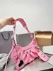 Bolso de hombro Diseñador de cuero genuino Le Cagole Bolso de motocicleta Mujer Moda de lujo Cruzado Rosa Negro Plata con herrajes dorados Bolso retro de lujo para niñas