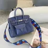 2024 nuova borsa da donna in vera pelle con inserto in tela moda tracolla a forma di onda borsa a tracolla diagonale singola portatile