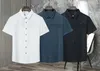 Mens Polos Summer Dorts Men T Cardigan Designer Designer Button Tapel Workplace Tees قصيرة الأكمام من أعلى جودة الأزياء قميص Busin DHKBM