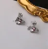 Kwaliteit Liefde Saturn Stud Oorbellen met volledige juwelen Speciaal ontwerp Lichte luxe Zoete oorbellen Internet Beroemdheid Minimalistisch ontwerp Oorbellen Zilveren naald