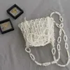 Hollow Bow Ladies Handbags Handmade Woven Beaded Pearl Exquisite Elegant Shiny Female Coin Purse Women Mobile Phone Bag 240328