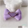 デザイナードッグヘアクリップブランドアパレルかわいい子犬の小さな弓の弓を金属製の手作りのアクセサリー弓ペットグルーミング製品紫色