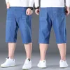 Męskie dżinsy plus rozmiar 48 50 150 kg Jeńcowe Krótkie mężczyzn Casual Cienka moda Letni spodnie Elastyczne luźne duże duże duże 5xl 6xl 7xl