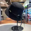 Celebrity Xiaoxiangfeng Tempérament élégant chapeau haut de gamme Femme / été coton et chanvre Chapeau de pêcheur respirant Version coréenne Bow Sun Visor Hat