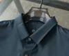 Mens Polos Summer Dorts Men T Cardigan Designer Designer Button Tapel Workplace Tees قصيرة الأكمام من أعلى جودة الأزياء قميص Busin DHKBM