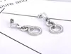 Pendientes de tuerca de acero inoxidable, círculo geométrico brillante, números romanos de cristal CZ a la moda para mujeres y niñas E21147