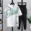 Tracksuits masculinos de manga curta t-shirt conjunto verão 2024 esportes em torno do pescoço top calças de secagem rápida de duas peças elegantes