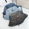 Designer cappello a secchiello moda di lusso casual uomo cappello a secchiello designer Casquette quattro stagioni lettera cappelli a tesa larga donna pesca all'aperto parasole montato berretti