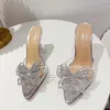 Scarpe eleganti 2024 Estate Strane Pantofole con tacco alto Sexy Street Woman Crystal Bowknot Toe Scarpe eleganti Sandali in PVC trasparente H240401PS70