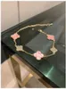 밴 체리 꽃 핑크 핑크 귀여운 클로버 팔찌 여성 라이트 고급스러운 성격 스파클링 다이아몬드 스타일의 수공예